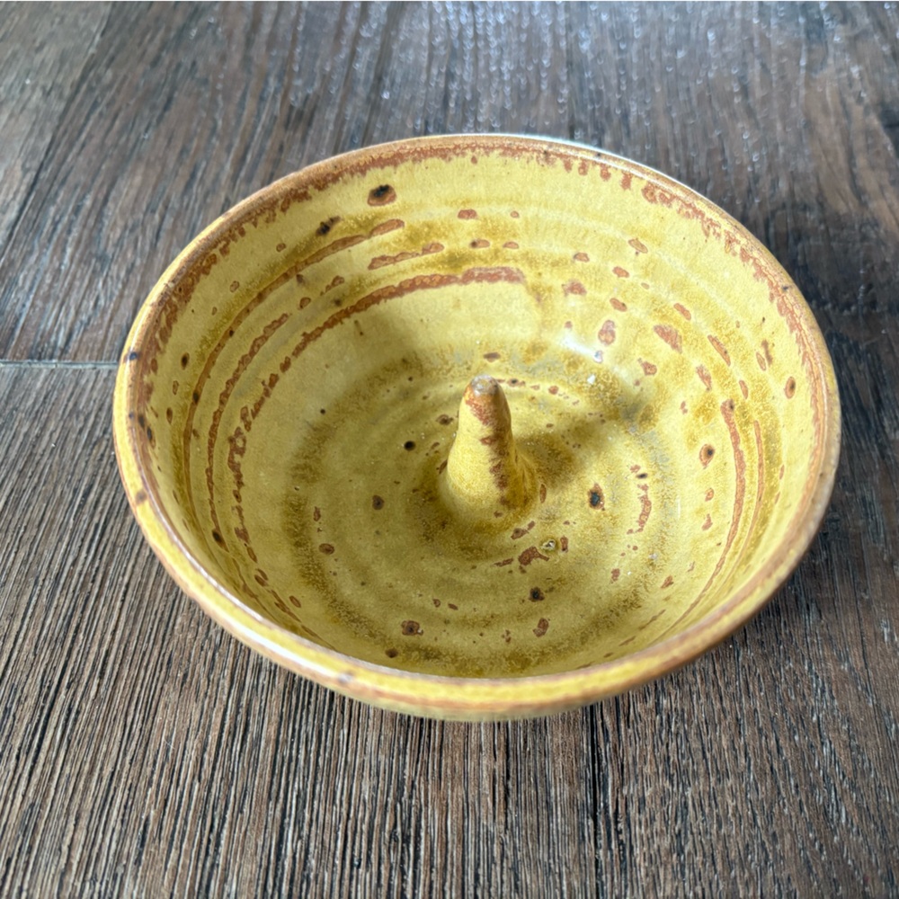 Apple baker homemade pottery piece.